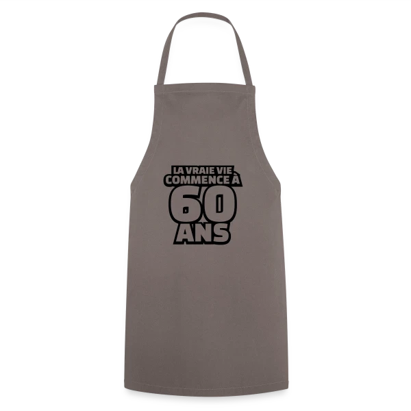 "La Vraie Vie à 60 Ans" : Humour pour les Soixante Ans sur Tablier de cuisine